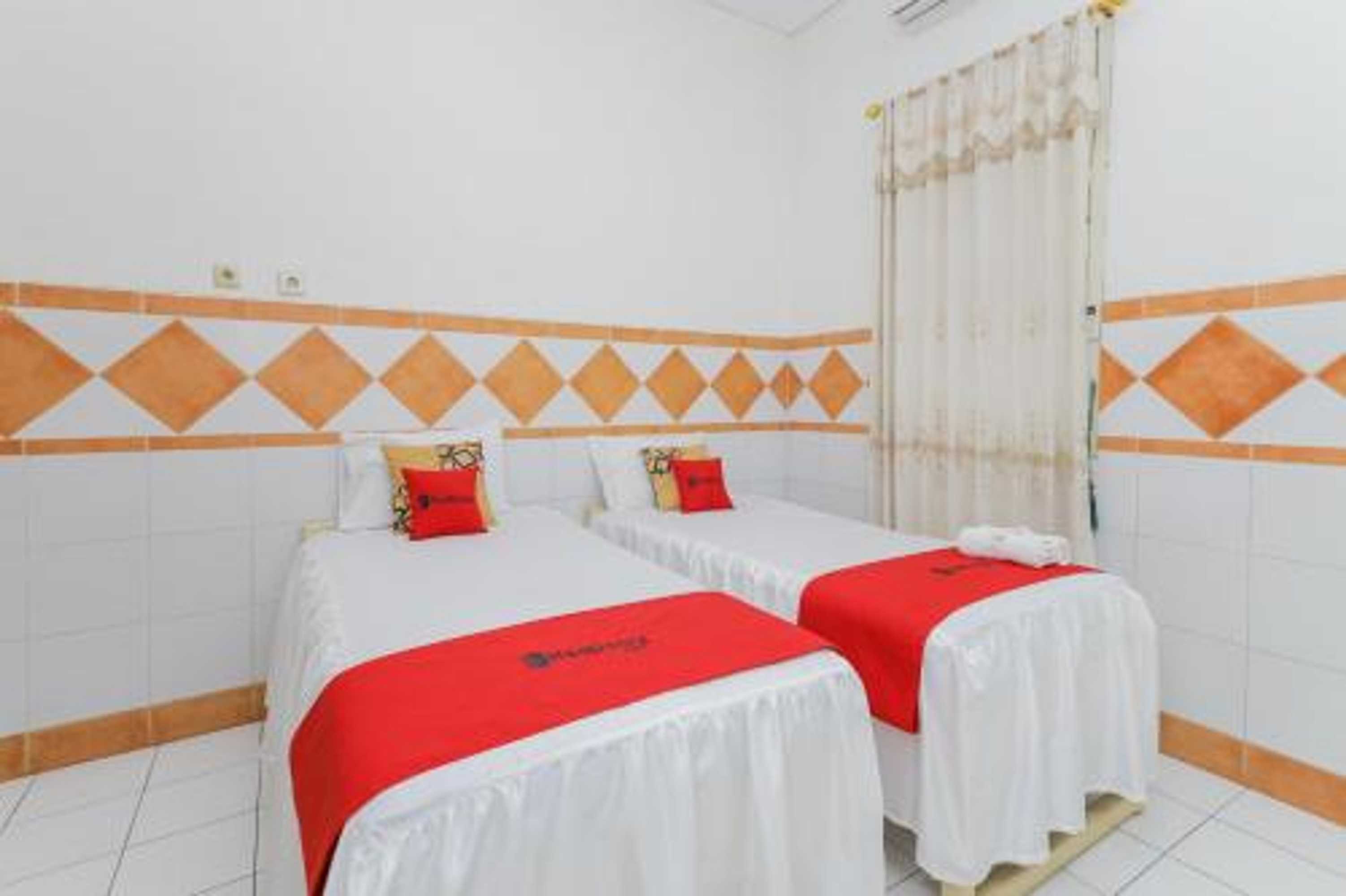 Gift card for Graha Surya Syariah by Reddoorz Gift card for Graha Surya Syariah by Reddoorz