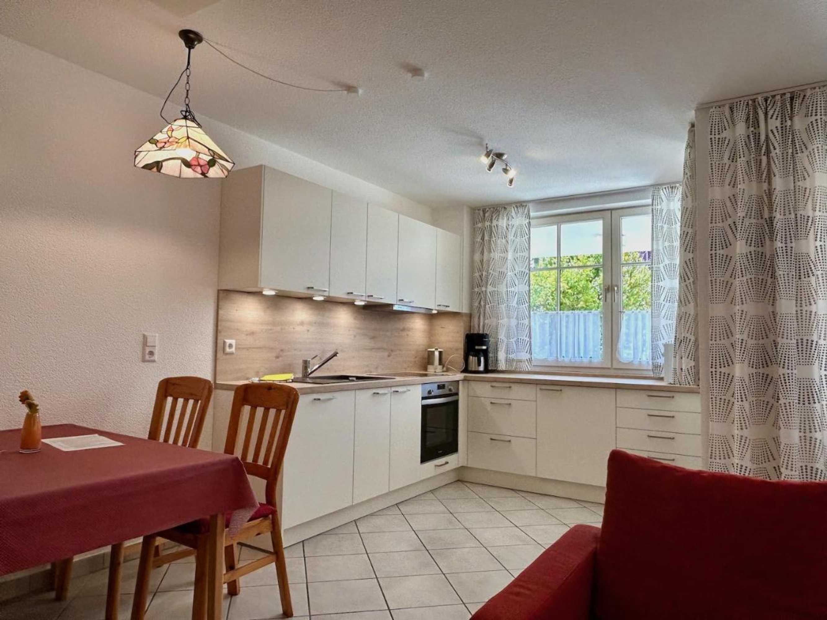 Gift card for Ferienwohnung Fischerpromenade - Seenah, im Fischerdorf Mit Großer Terrasse