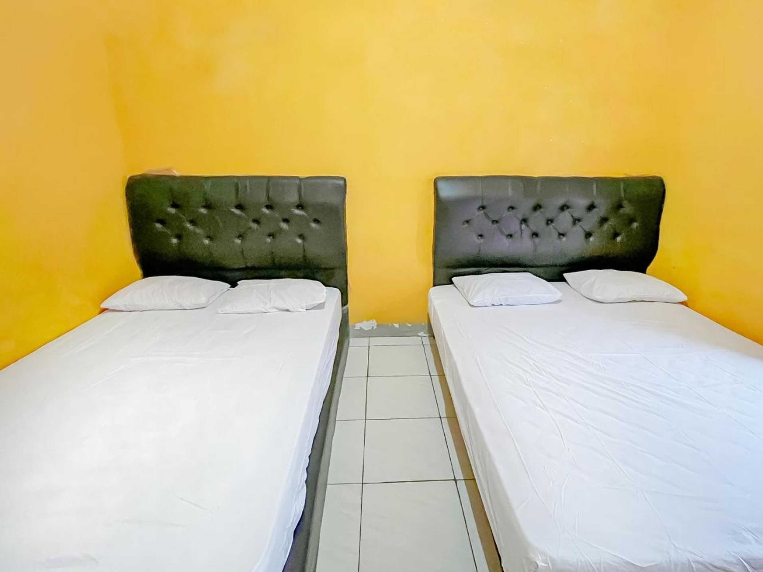 Gift card for Penginapan Diar Near Pantai Santolo Mitra Reddoorz Gift card for Penginapan Diar Near Pantai Santolo Mitra Reddoorz