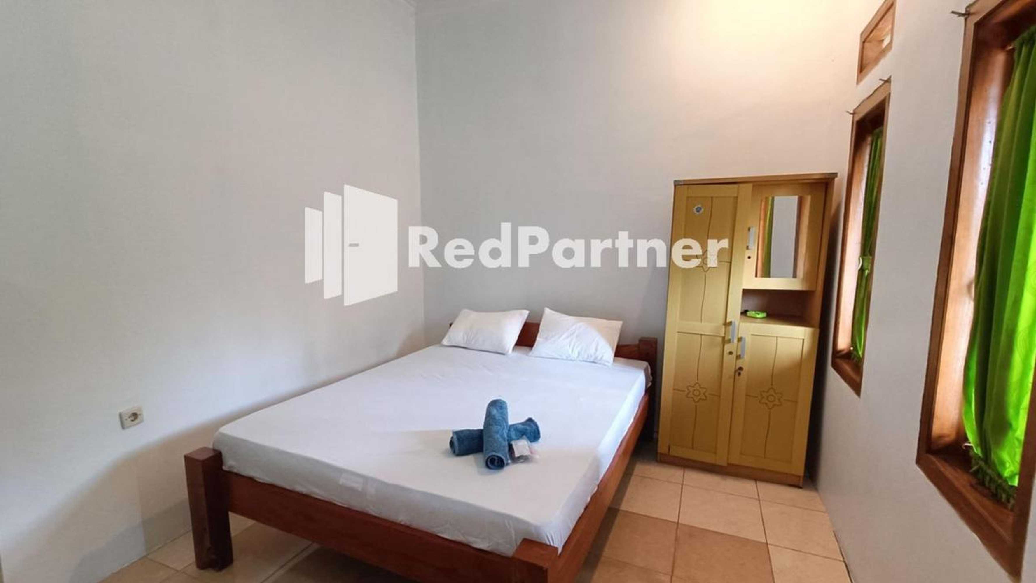 Gift card for Jogo Segoro Homestay Mitra Reddoorz Near Pantai Sundak Gunungkidul