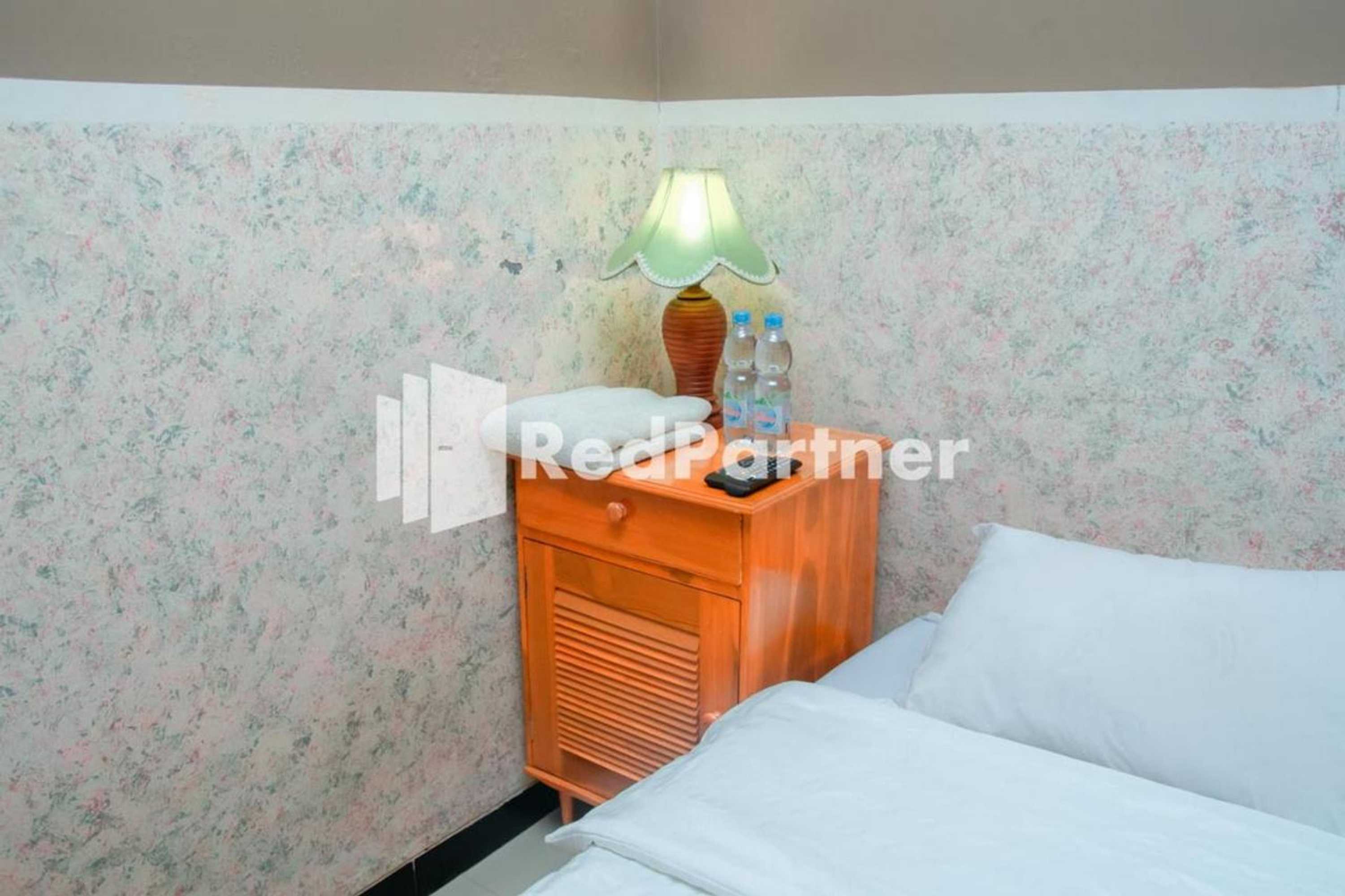 Gift card for Flamboyan Asri Syariah Mitra Reddoorz Near Kampung Inggris Pare