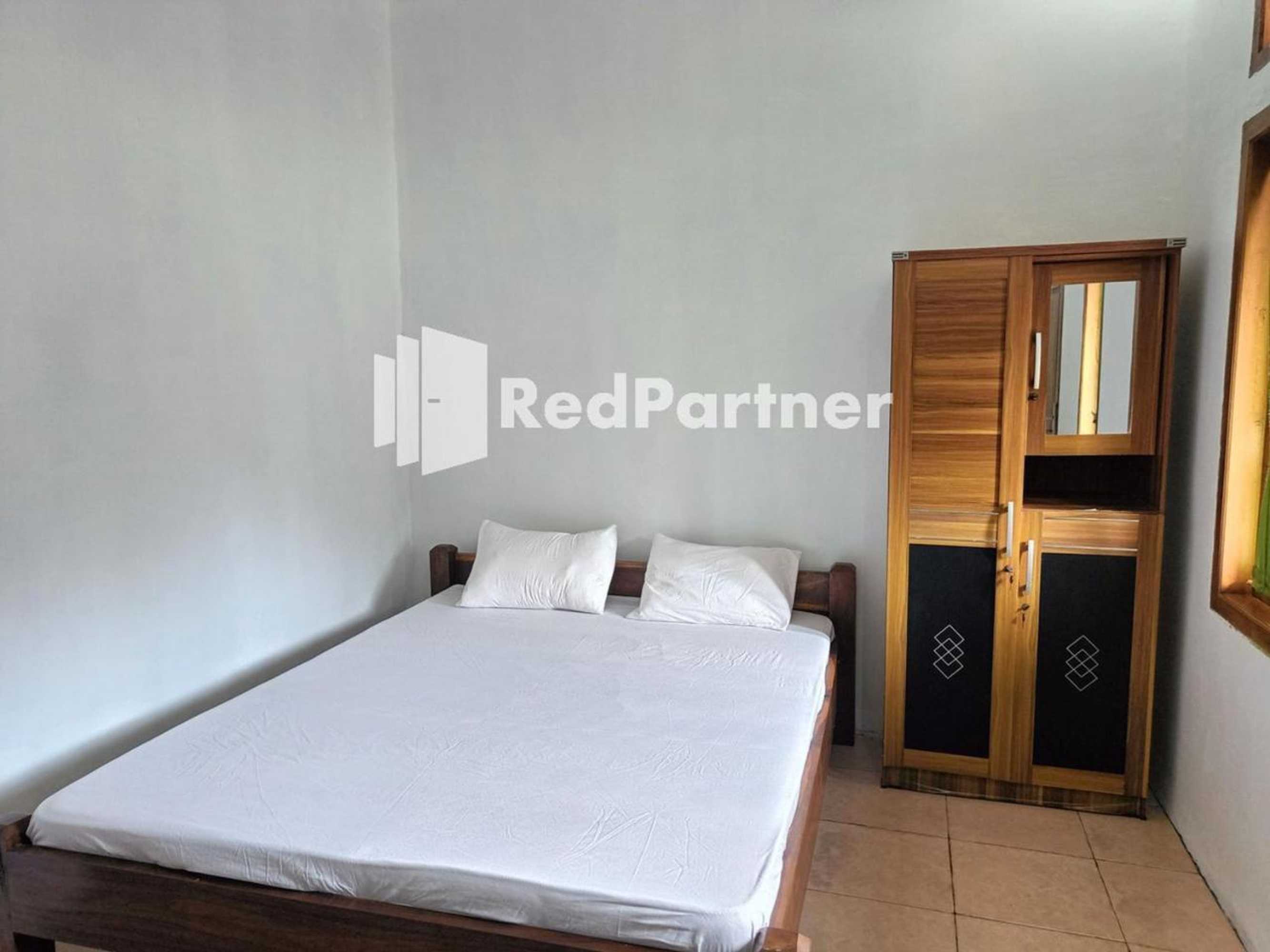 Gift card for Jogo Segoro Homestay Mitra Reddoorz Near Pantai Sundak Gunungkidul Gift card for Jogo Segoro Homestay Mitra Reddoorz Near Pantai Sundak Gunungkidul