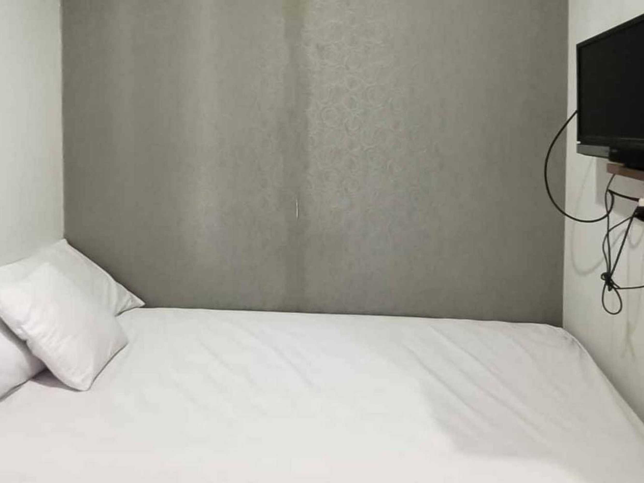 Gift card for Aimer Guest House Syariah Mitra Reddoorz