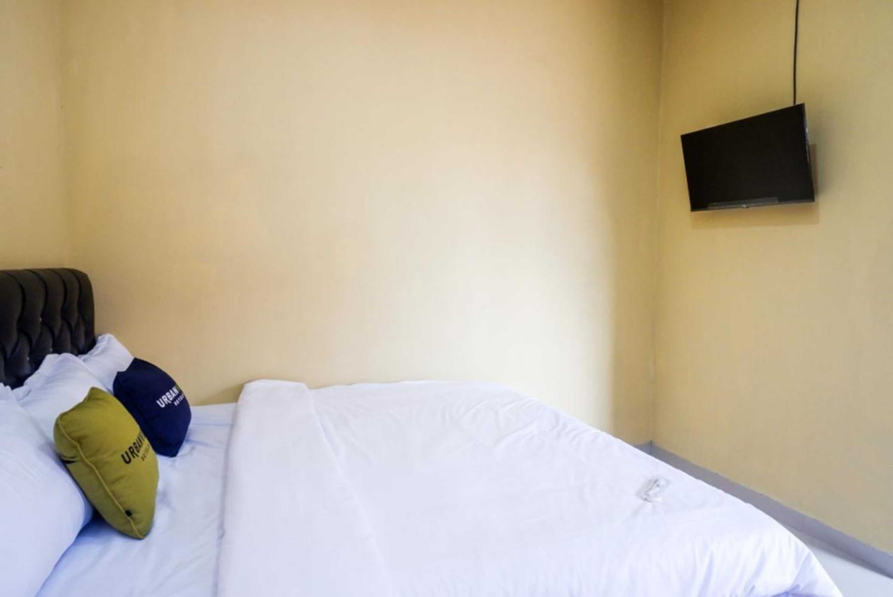 Gift card for Urbanview Hotel Telu Wolu Monjali by Reddoorz