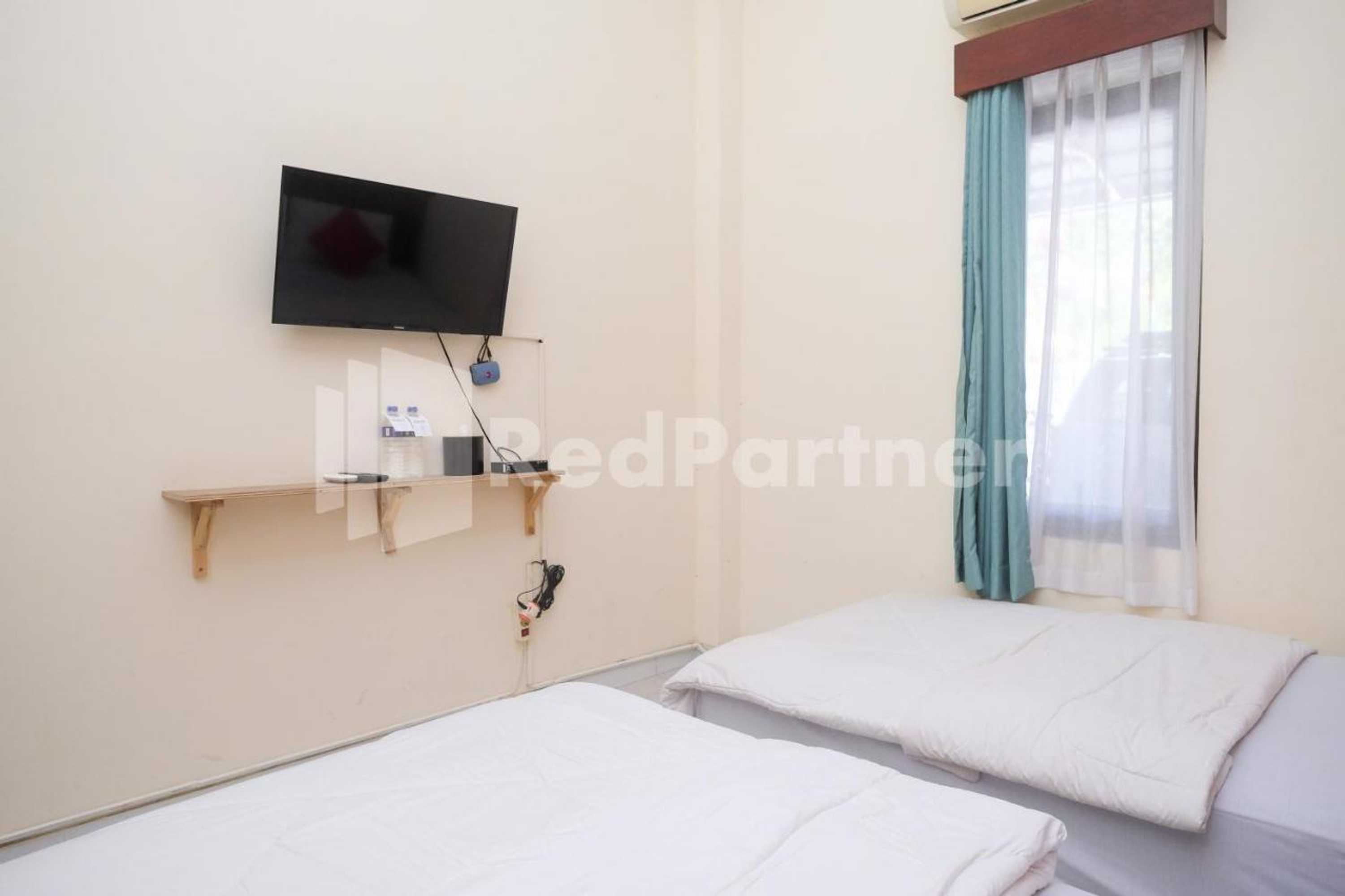 Gift card for Travelista Homestay Near Gor Candradimuka Semarang Mitra Reddoorz