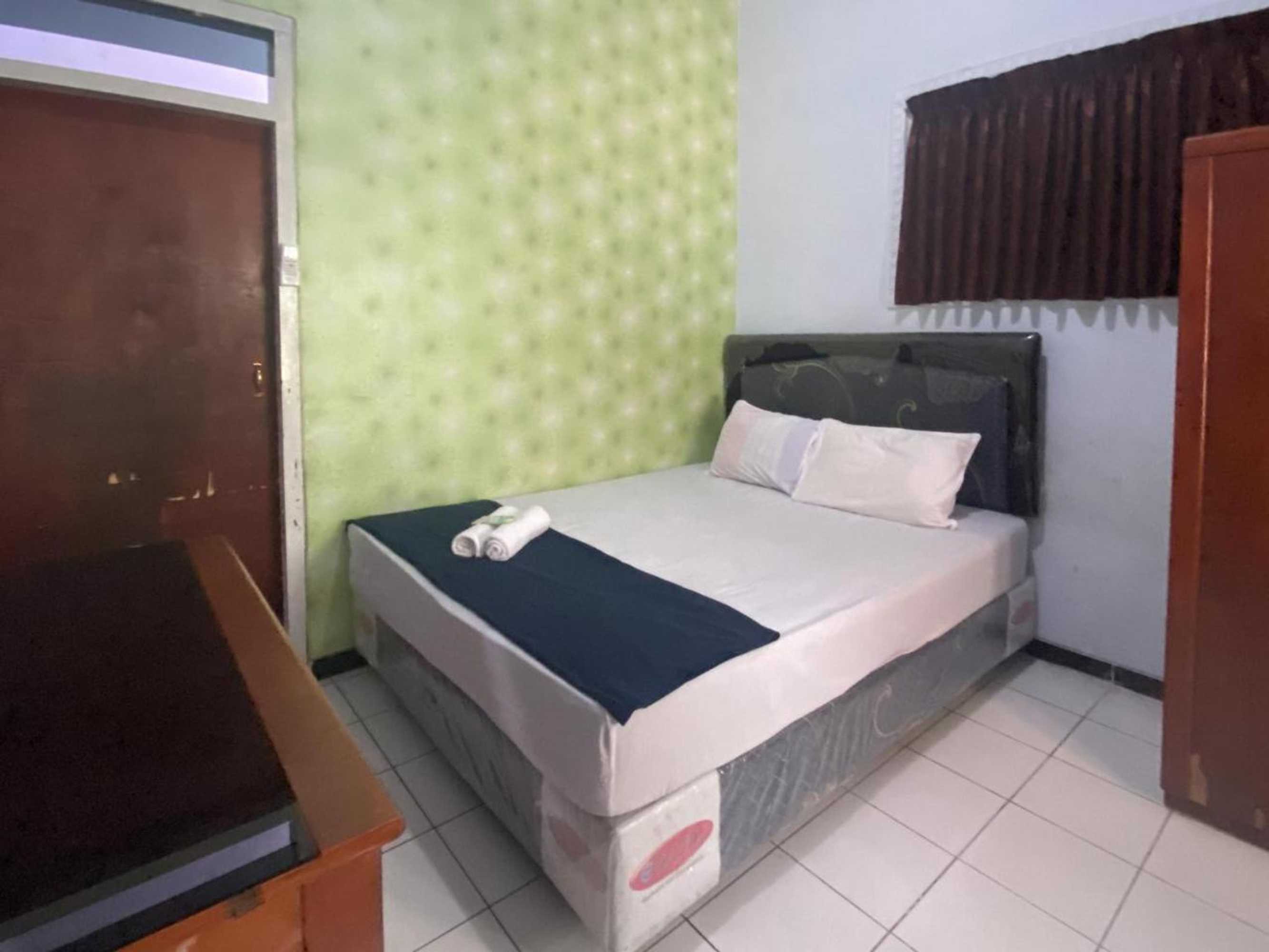 Gift card for Guest House Hj Muriyah Syariah Slawi Mitra Reddoorz