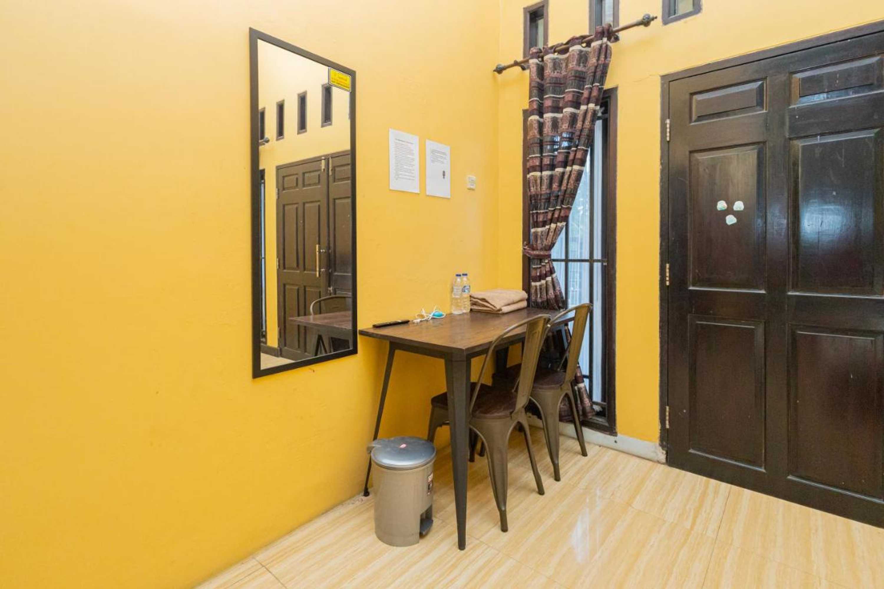 Gift card for Boss Residence Serang Mitra Reddoorz