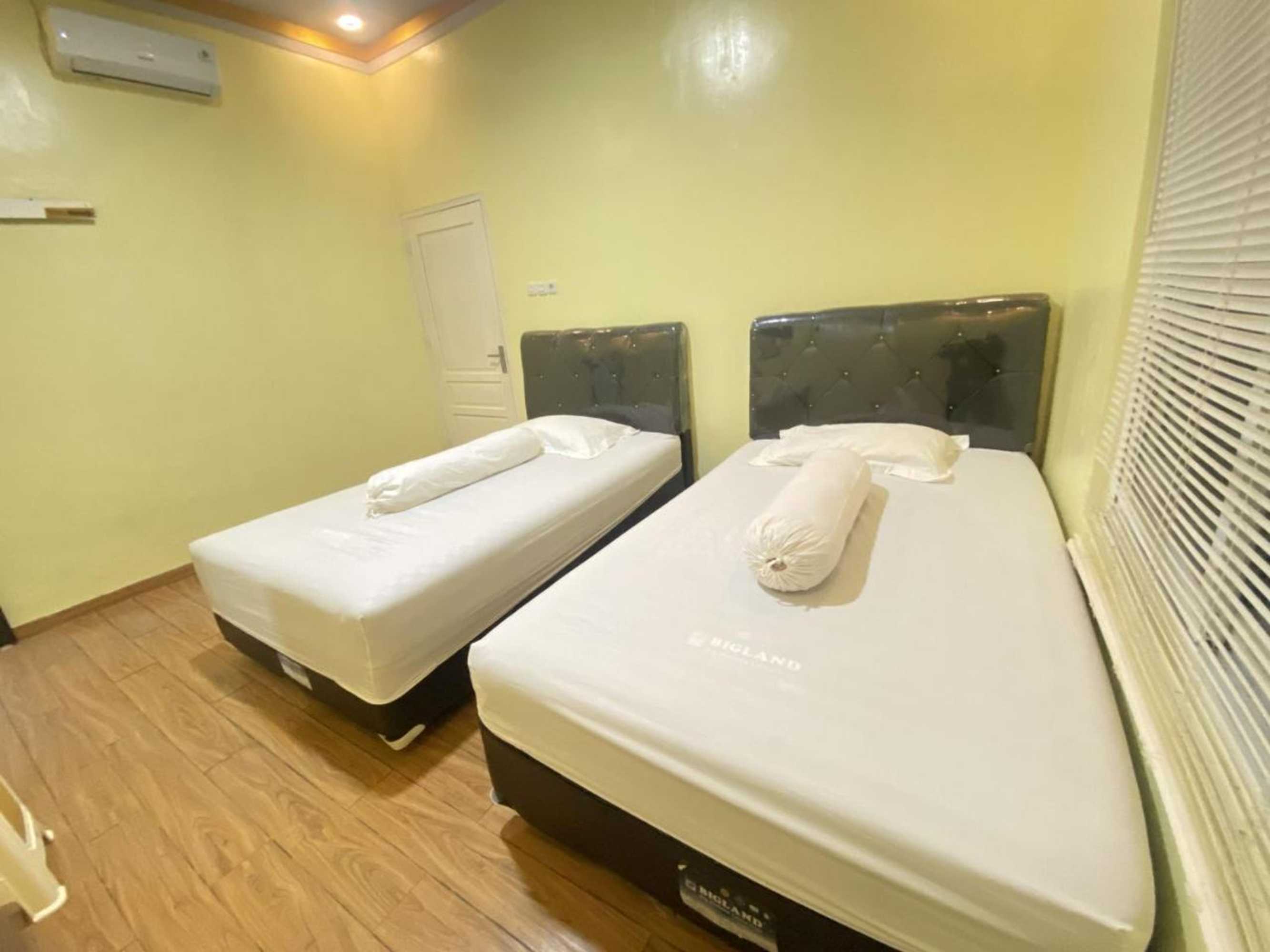 Gift card for Homestay RN Near Taman Bambu Runcing Polewali Mitra Reddoorz