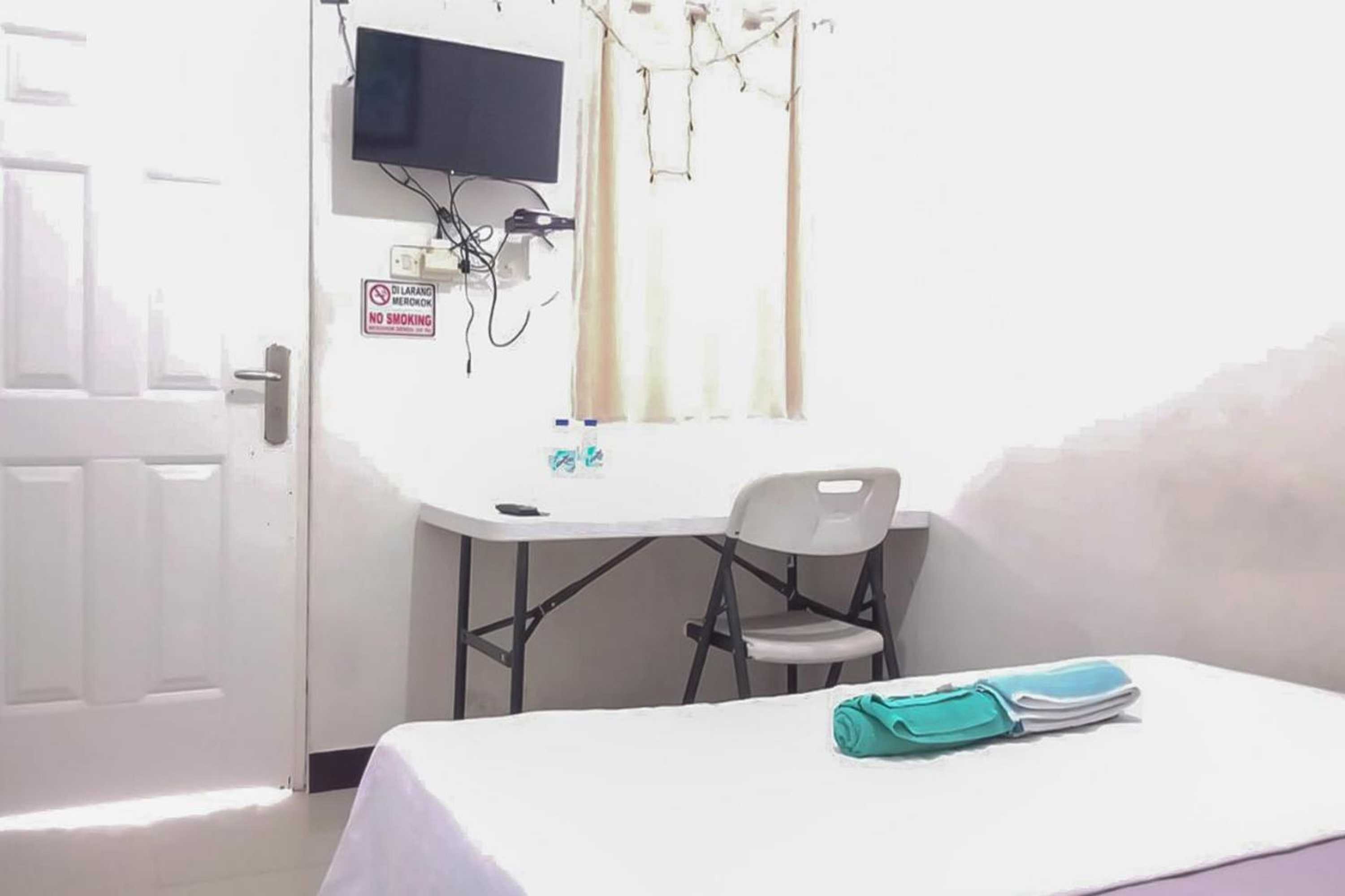 Gift card for Waringin Guest House Tegal Mitra Reddoorz Gift card for Waringin Guest House Tegal Mitra Reddoorz