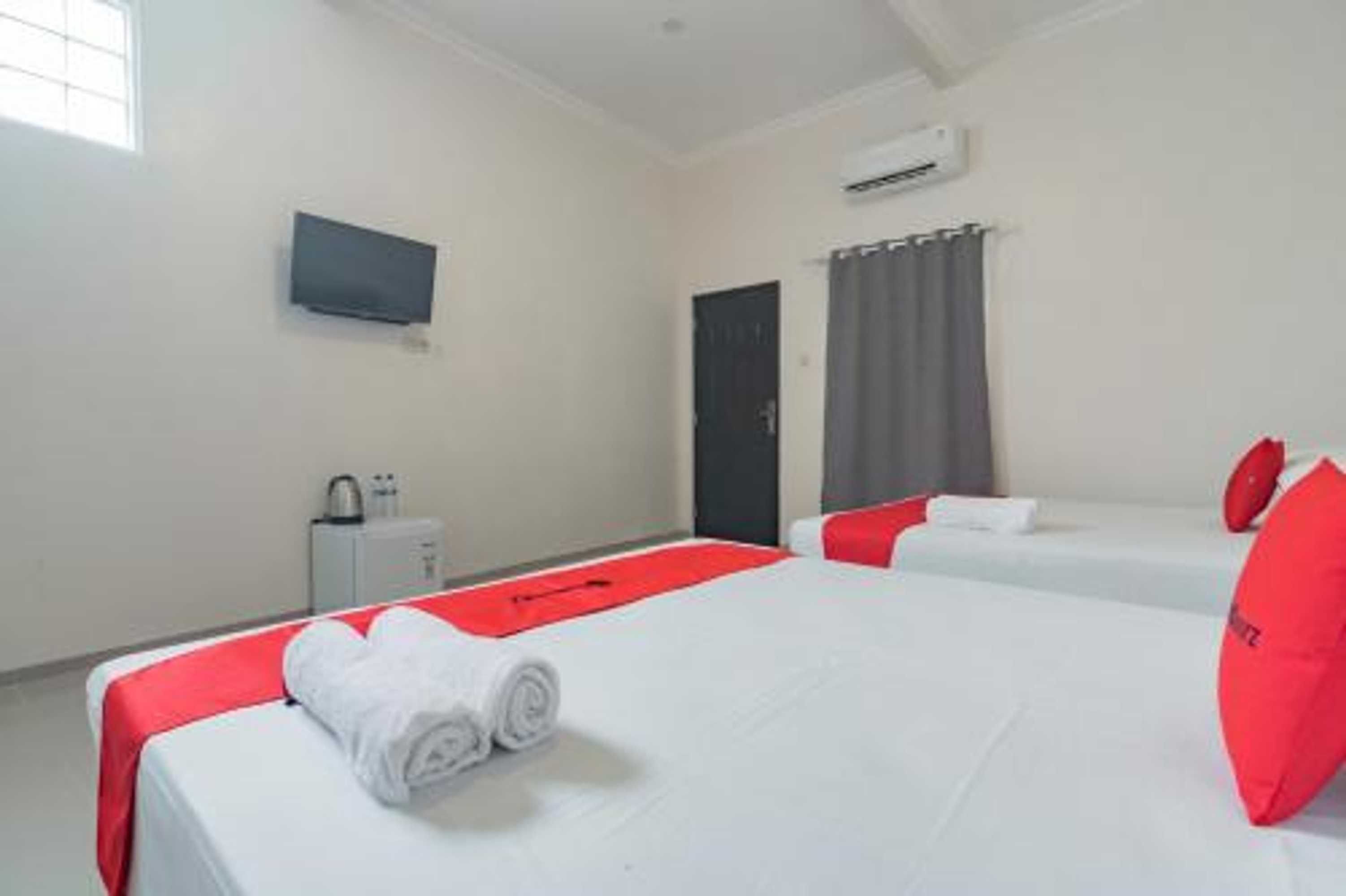 Gift card for Perintis Guesthouse Tasikmalaya by Reddoorz Gift card for Perintis Guesthouse Tasikmalaya by Reddoorz