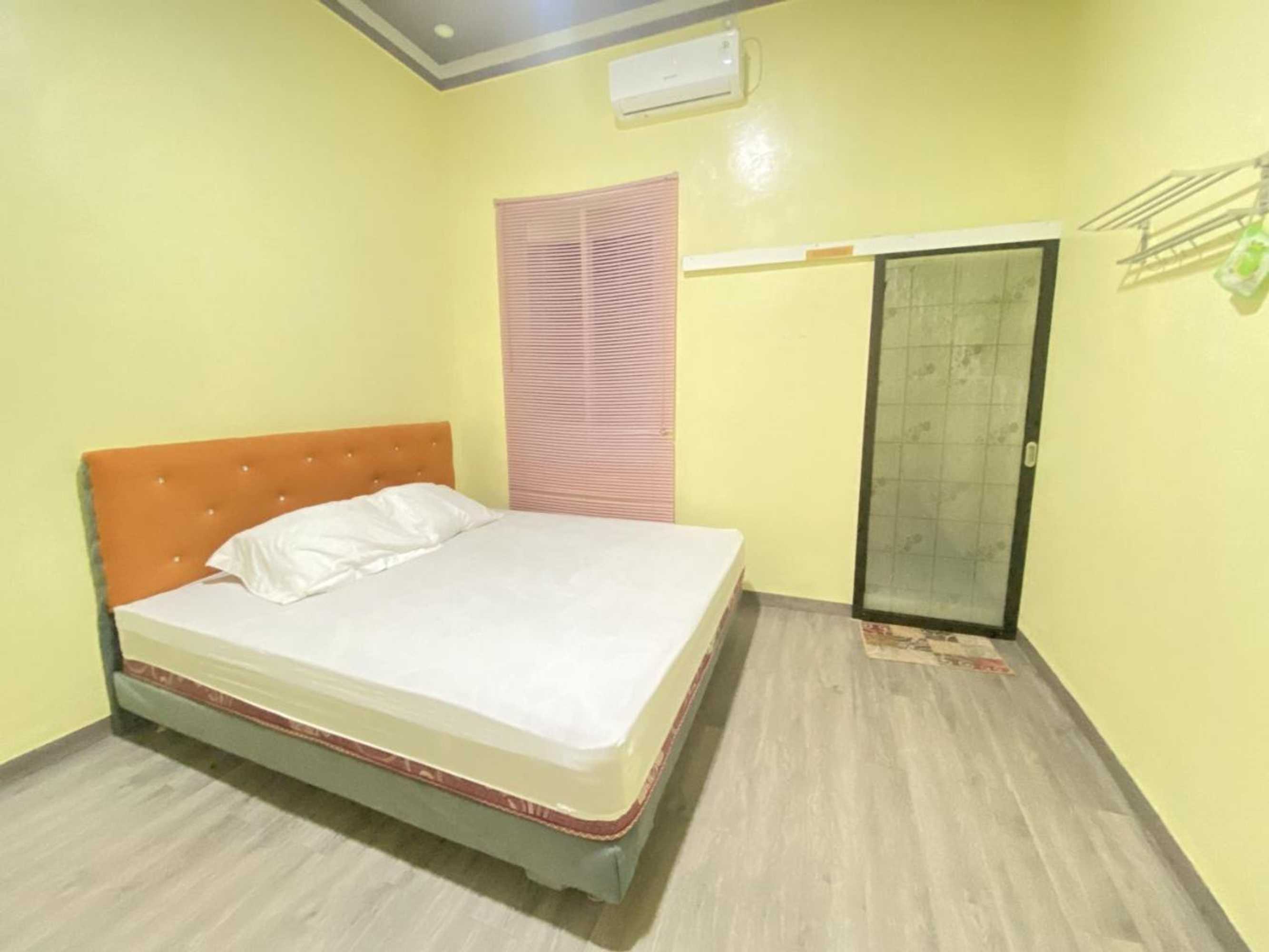 Gift card for Homestay RN Near Taman Bambu Runcing Polewali Mitra Reddoorz