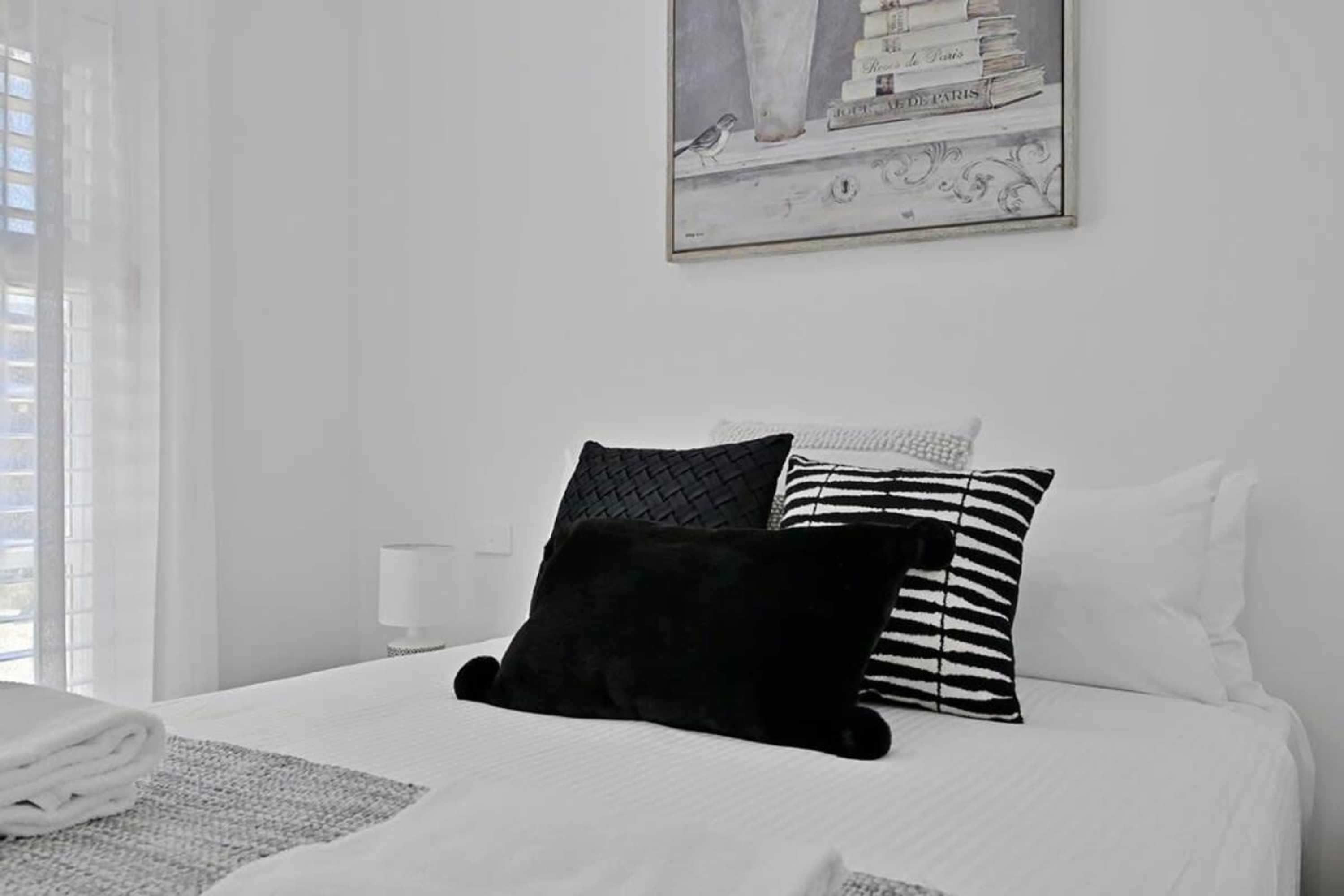 Gift card for The Elm Apartments - The Black & White Room