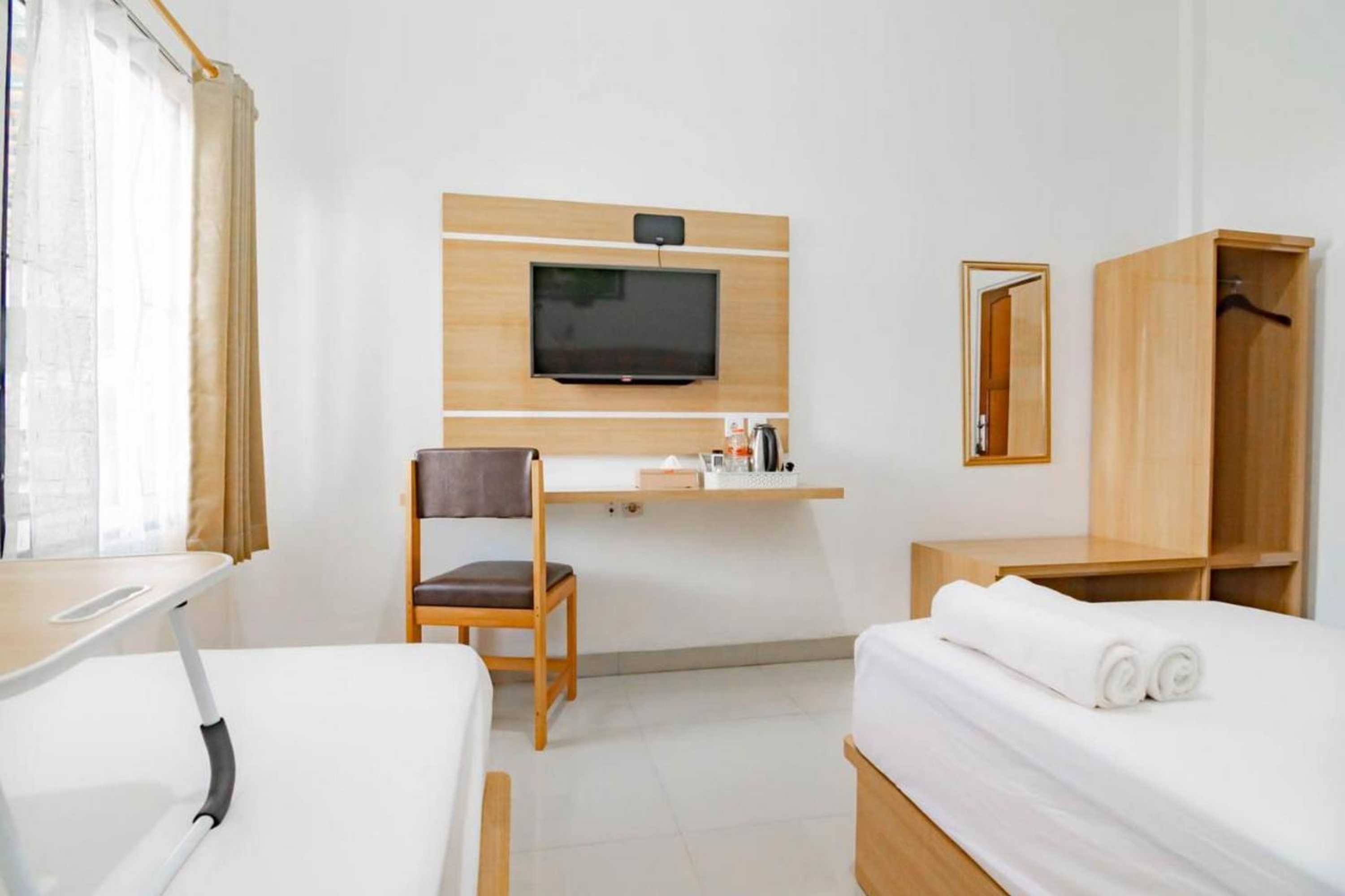 Gift card for Urbanview Hotel Bundaran Besar Palangkaraya by Reddoorz Gift card for Urbanview Hotel Bundaran Besar Palangkaraya by Reddoorz