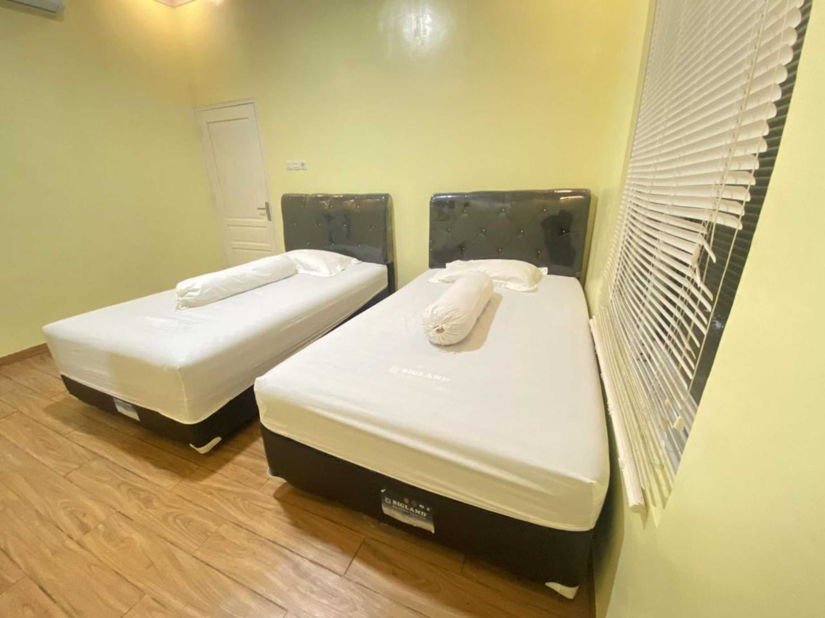 Gift card for Homestay RN Near Taman Bambu Runcing Polewali Mitra Reddoorz