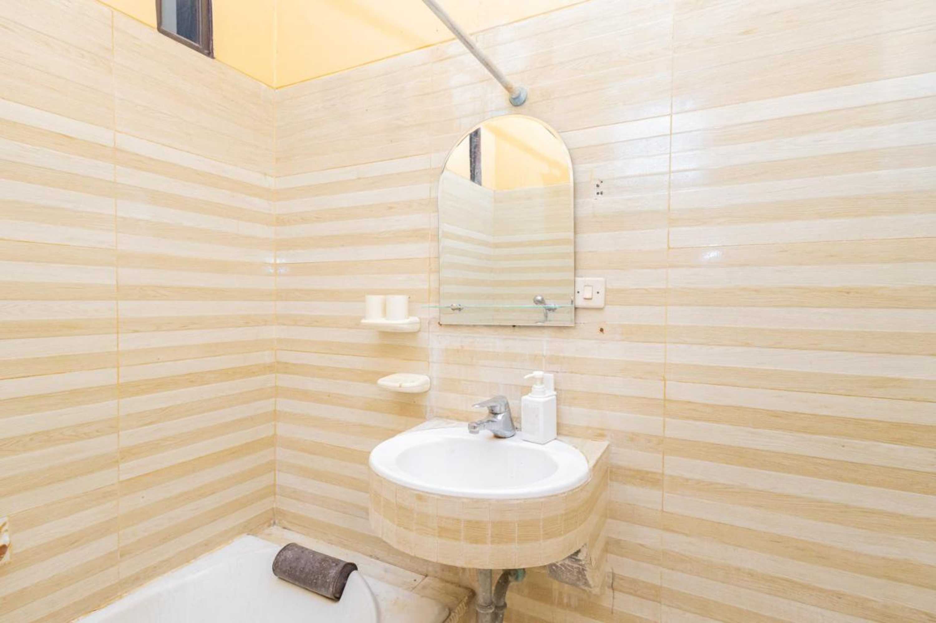 Gift card for Boss Residence Serang Mitra Reddoorz