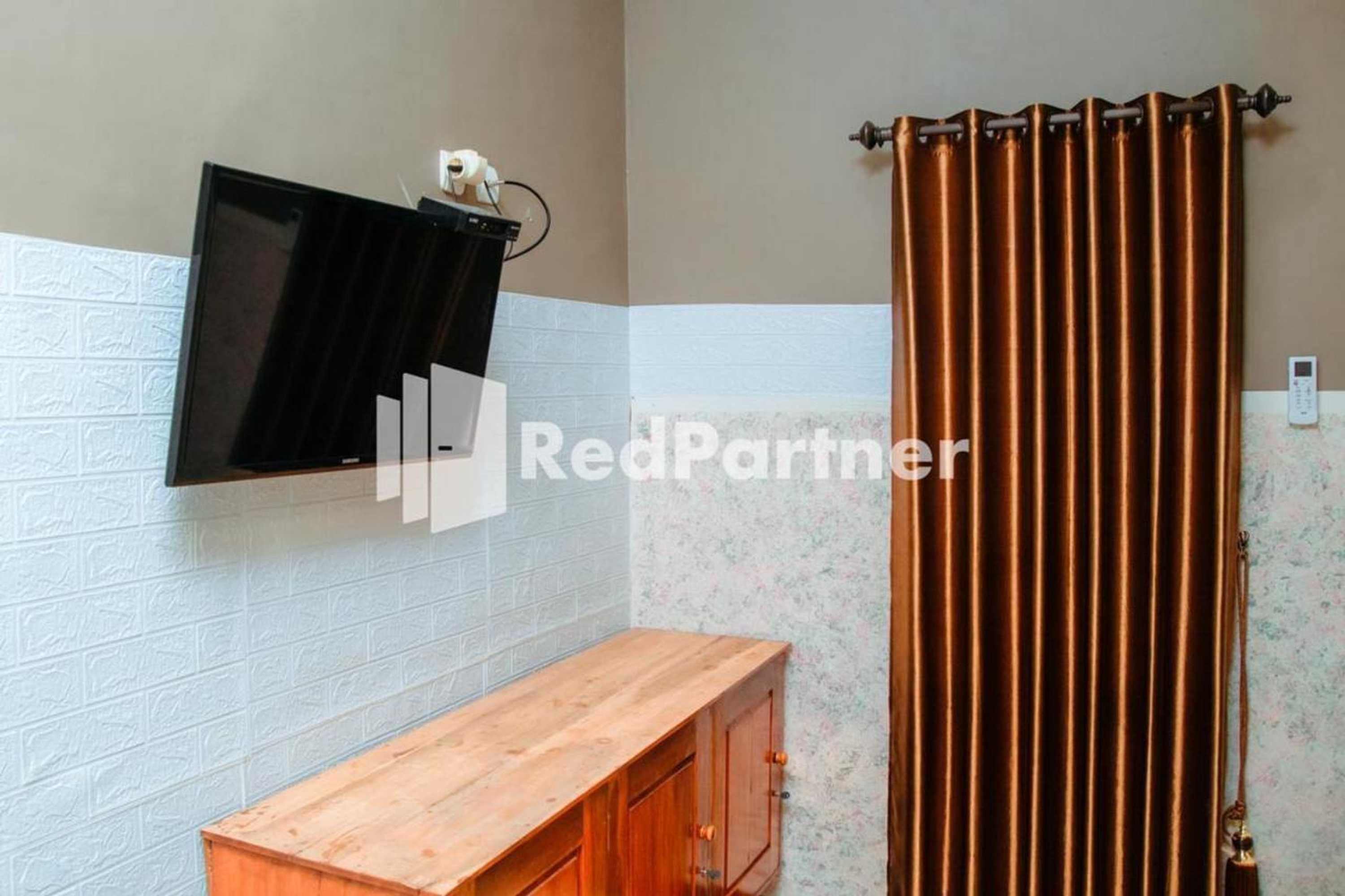 Gift card for Flamboyan Asri Syariah Mitra Reddoorz Near Kampung Inggris Pare