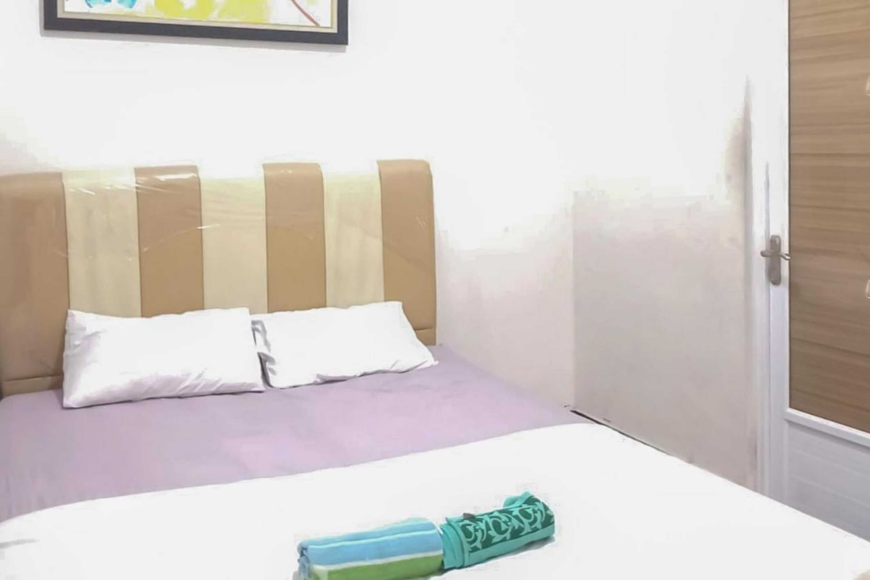 Gift card for Waringin Guest House Tegal Mitra Reddoorz Gift card for Waringin Guest House Tegal Mitra Reddoorz