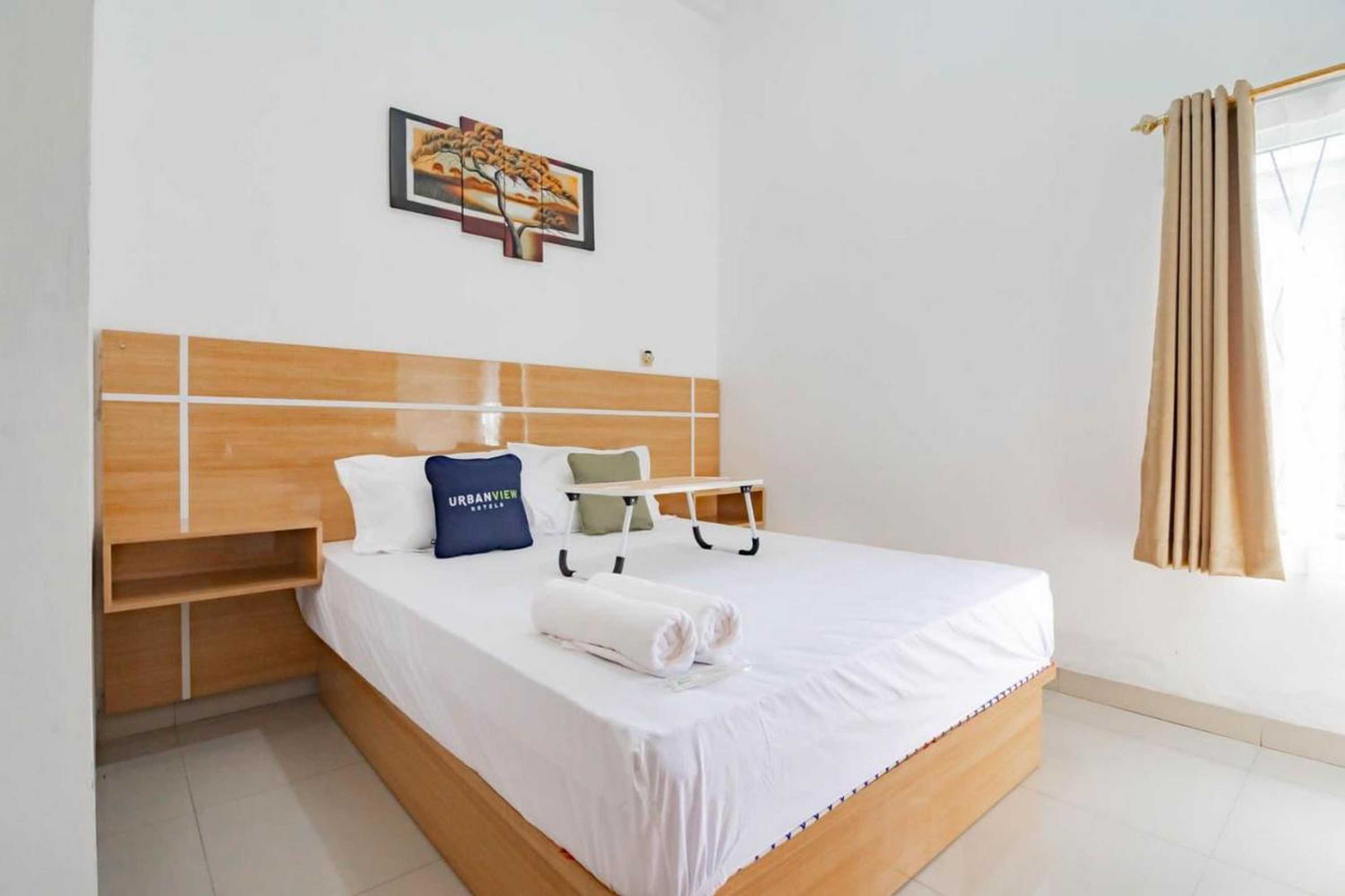 Gift card for Urbanview Hotel Bundaran Besar Palangkaraya by Reddoorz Gift card for Urbanview Hotel Bundaran Besar Palangkaraya by Reddoorz