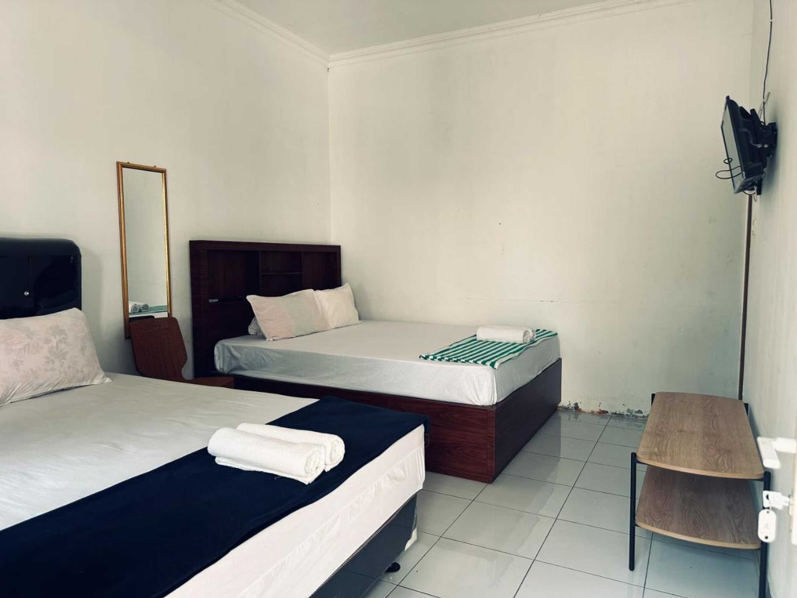 Gift card for Guest House Hj Muriyah Syariah Slawi Mitra Reddoorz